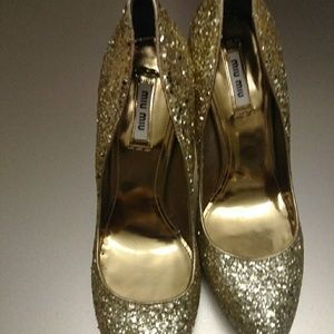 Miu Miu gold stilettos